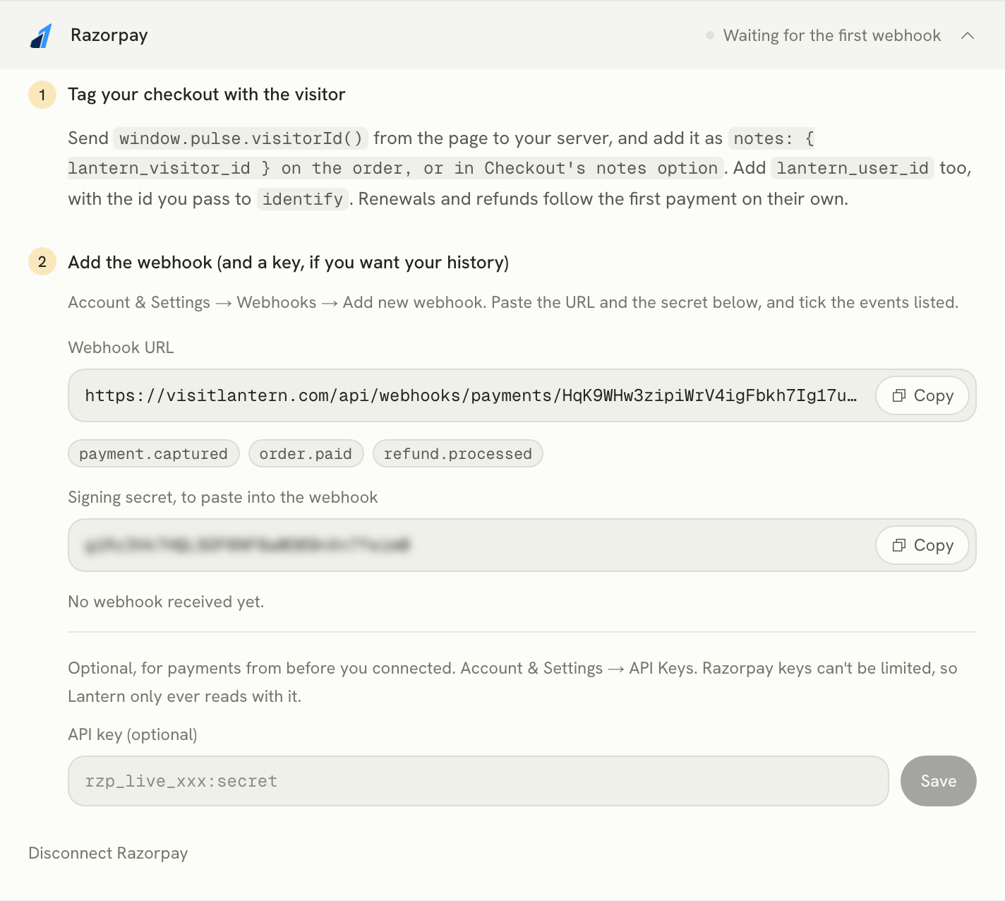 Lantern's Razorpay setup panel: step 1, tag your checkout with the visitor id in notes; step 2, the webhook URL, the events to tick, a generated signing secret, and an optional API key for history